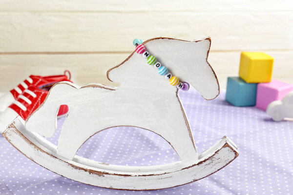 Состав с браслетом с именем ребенка
 