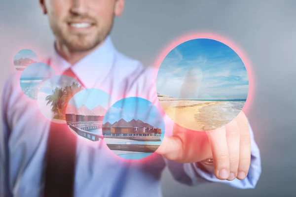 Man choosing last minute tour on virtual screen. Travel agency concept — Stock Photo, Image