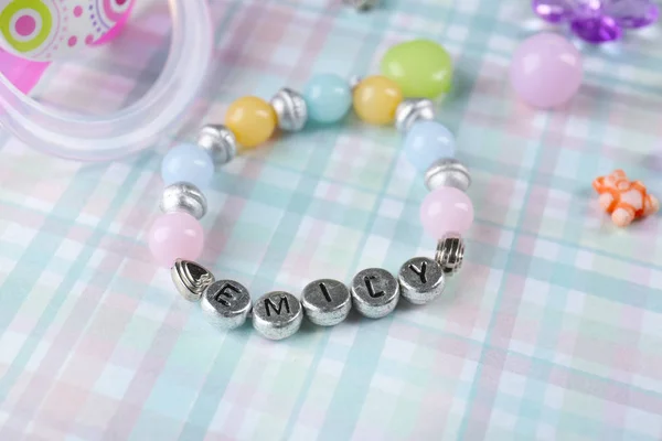 Bracelet with baby name — Stock Photo, Image