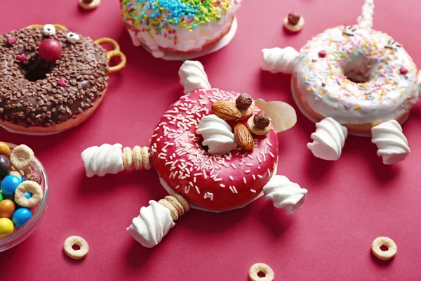 Funny decorated donuts — Stock Photo, Image