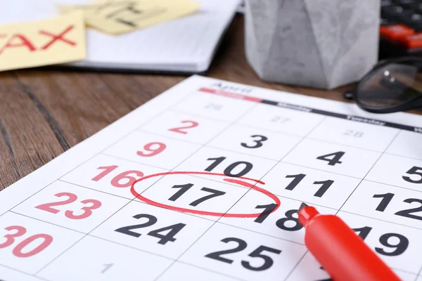 Marked calendar on table — Stock Photo, Image
