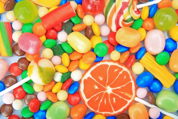 Tasty and colorful candies with — Stock Photo, Image