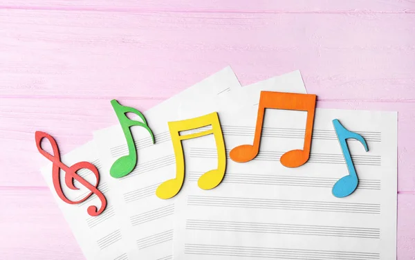 Musical notes lying on music sheet — Stock Photo, Image