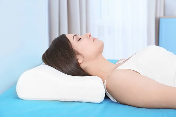 Woman sleeping on orthopedic pillow — Stock Image Woman sleeping on orthopedic pillow Stock Image