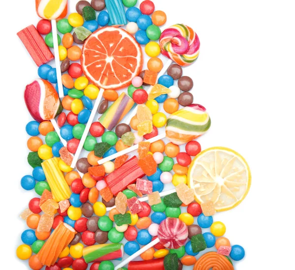 Tasty lollipops and colorful candies — Stock Photo, Image