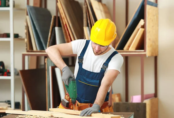 Handsome young carpenter — Stock Photo, Image