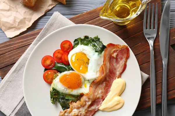 Plate with tasty eggs — Stock Photo, Image