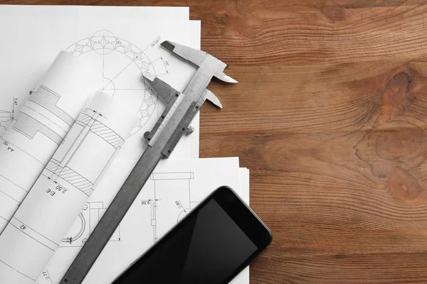 Blueprints on engineer's workplace — Stock Photo, Image