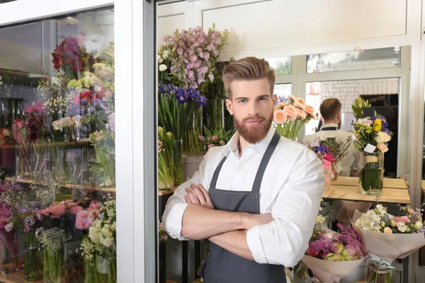 Young handsome florist — Stock Photo, Image