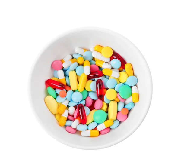 Bowl with colorful assorted pills — Stock Photo, Image