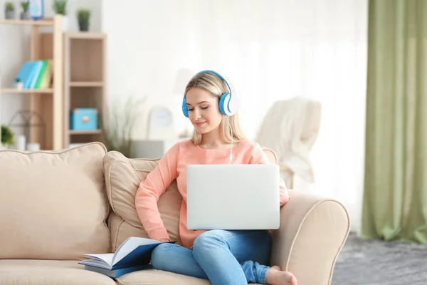 woman listening to audio book