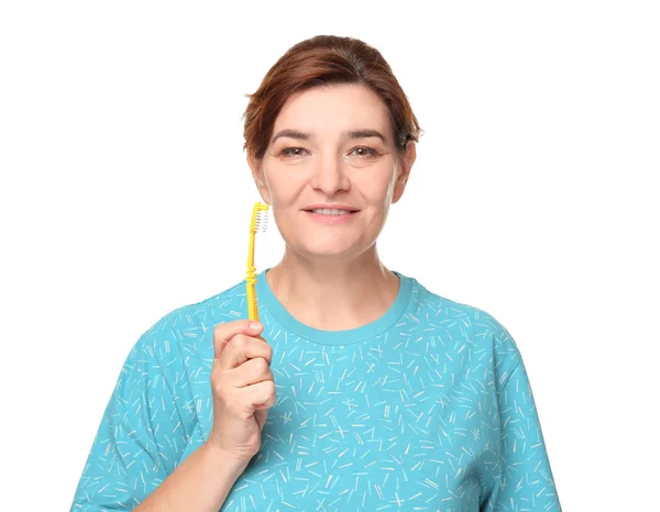 Mulher sênior com escova de dentes — Fotografia de Stock