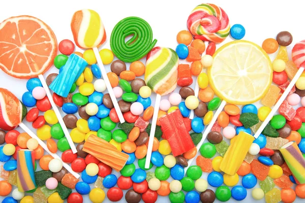 Leckere Lutscher und bunte Bonbons — Stockfoto