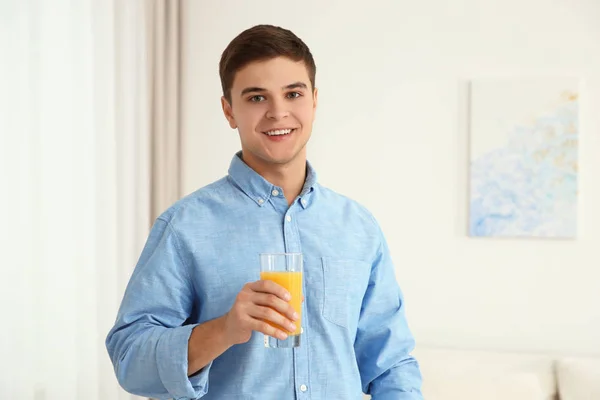 Man drinking juice — Stock Photo, Image