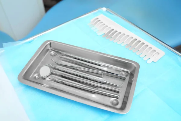 Dental tools in medical basin — Stock Photo, Image