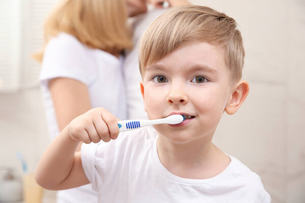  little boy brushing teeth 