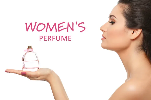 Woman with bottle of scent — Stock Photo, Image