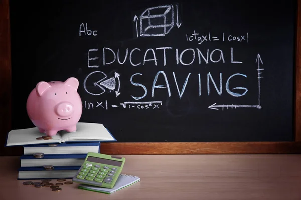 Piggy bank with books — Stock Photo, Image