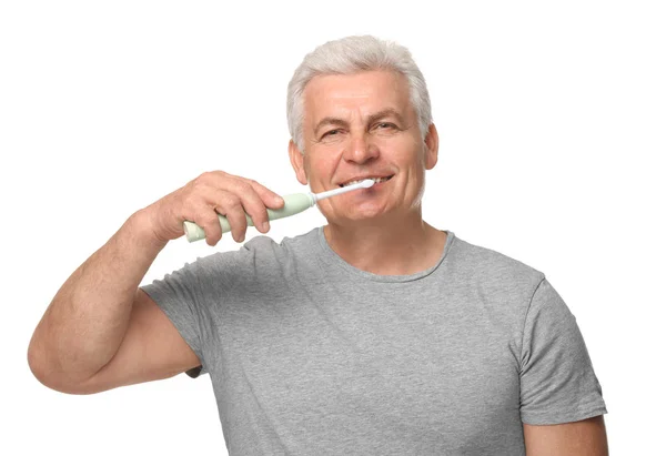 Senior man cleaning teeth — Stock Photo, Image