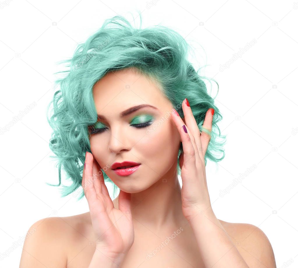 Trendy hairstyle ideas. Young woman with mint hair color on white background
