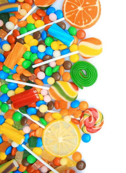 Tasty lollipops and colorful candies — Stock Photo, Image