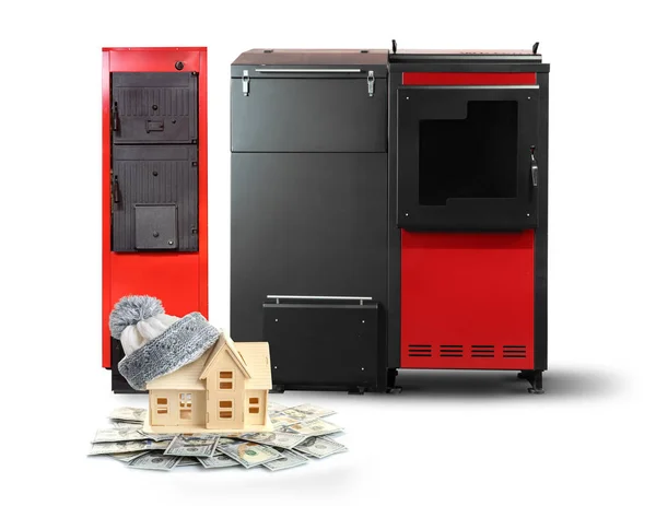 Toy house with money and solid fuel boilers — Stock Photo, Image