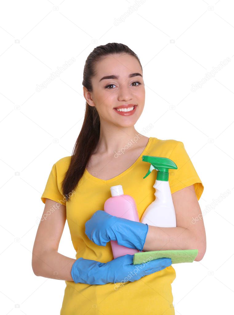 young woman holding cleaning supplies