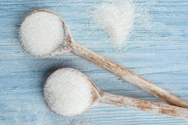 Wooden spoons with sugar — Stock Photo, Image