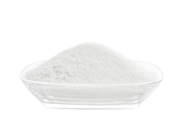 Сахар в миске на белом — стоковое фото