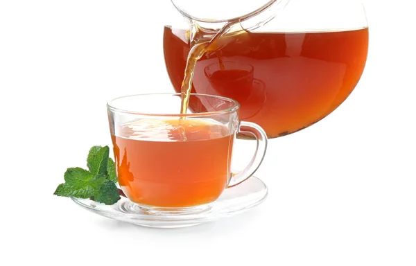 Pouring tea into glass cup — Stock Photo, Image
