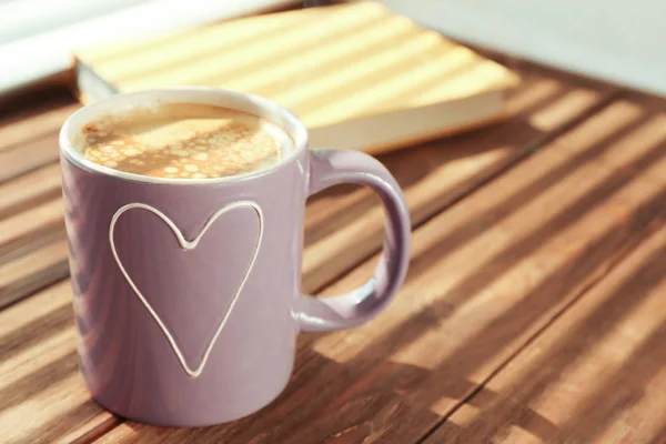 Cup with delicious coffee — Stock Photo, Image