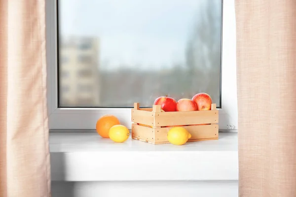 Wooden box with fresh fruits — Stock Photo, Image