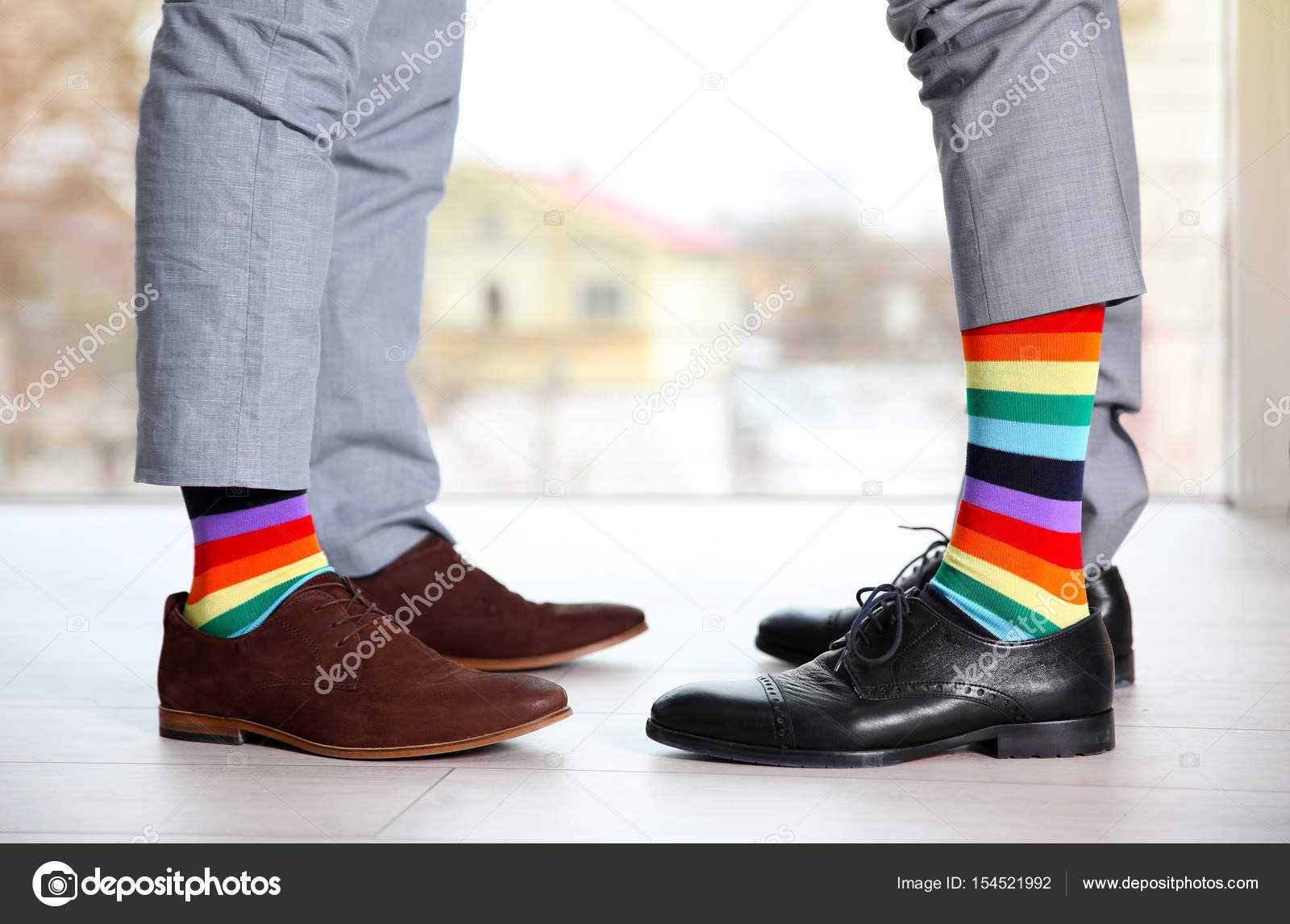 depositphotos_154521992-stock-photo-gay-couple-with-colorful-socks.jpg