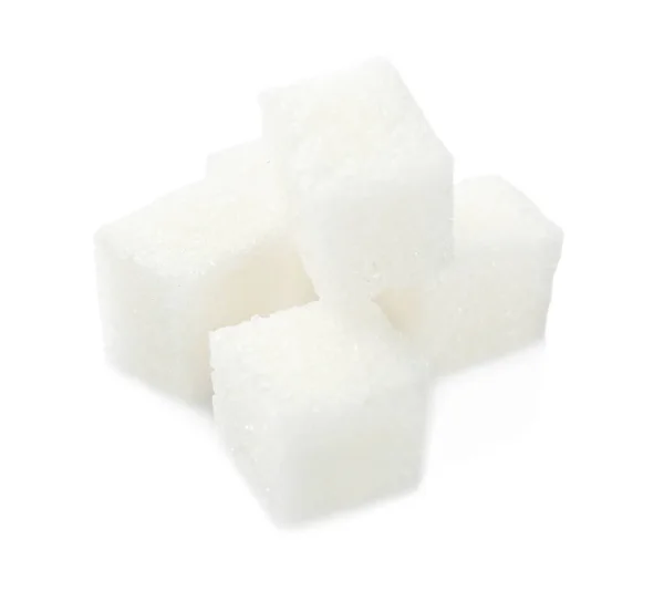 Sockerbitar på vit — Stockfoto