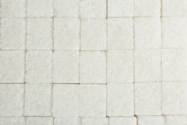 Sugar cubes as background — Stock Photo, Image