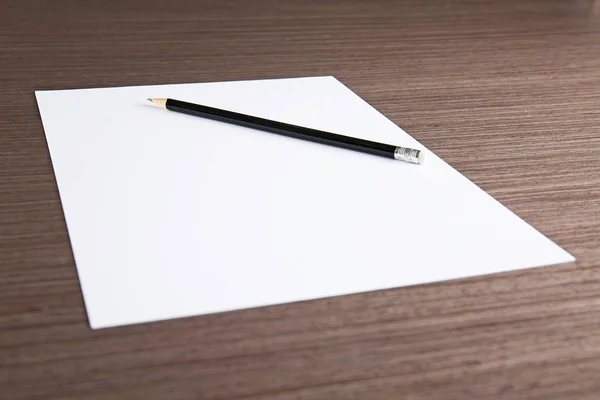 Empty paper sheet with pencil — Stock Photo, Image