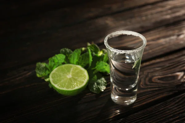 Tequila shot with juicy lime — Stock Photo, Image
