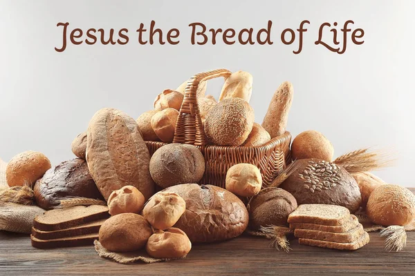Assortment of bread and text on light background — Stock Photo, Image