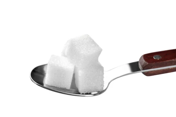 Cubos de açúcar na colher — Fotografia de Stock