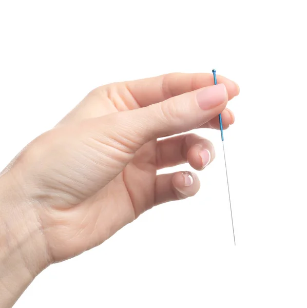 Hand with needle for acupuncture — Stock Photo, Image