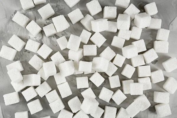 Sugar cubes as background — Stock Photo, Image