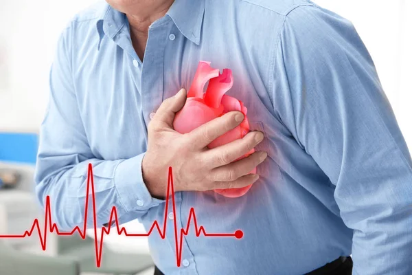 Senior man suffering from chest pain — Stock Photo, Image