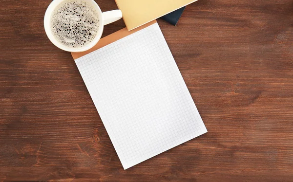 Empty notebook with cup of coffee — Stock Photo, Image