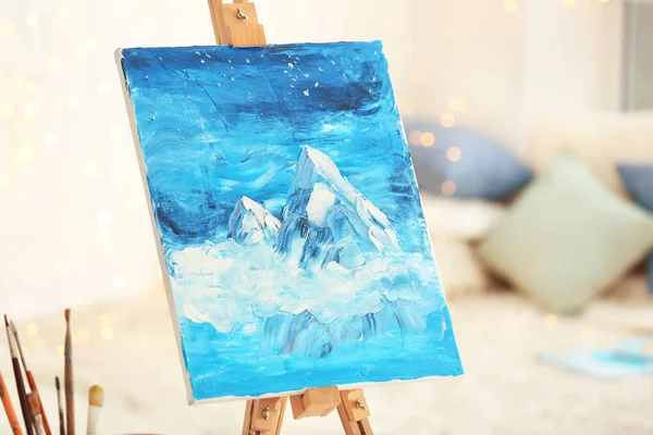 Beautiful oil painting on easel — Stock Photo, Image