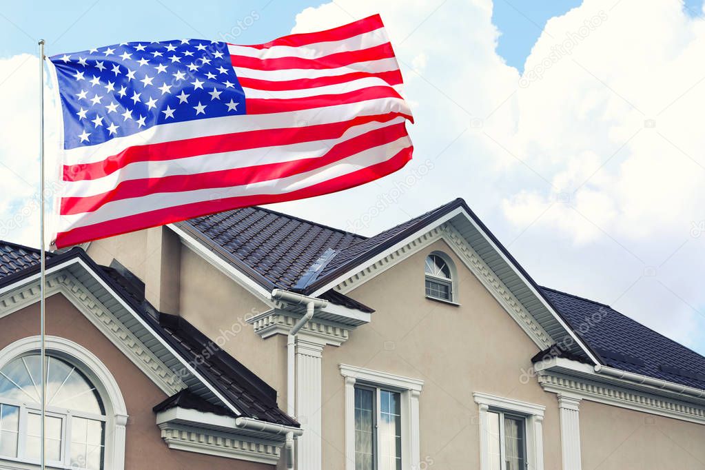 Waving USA flag and house 