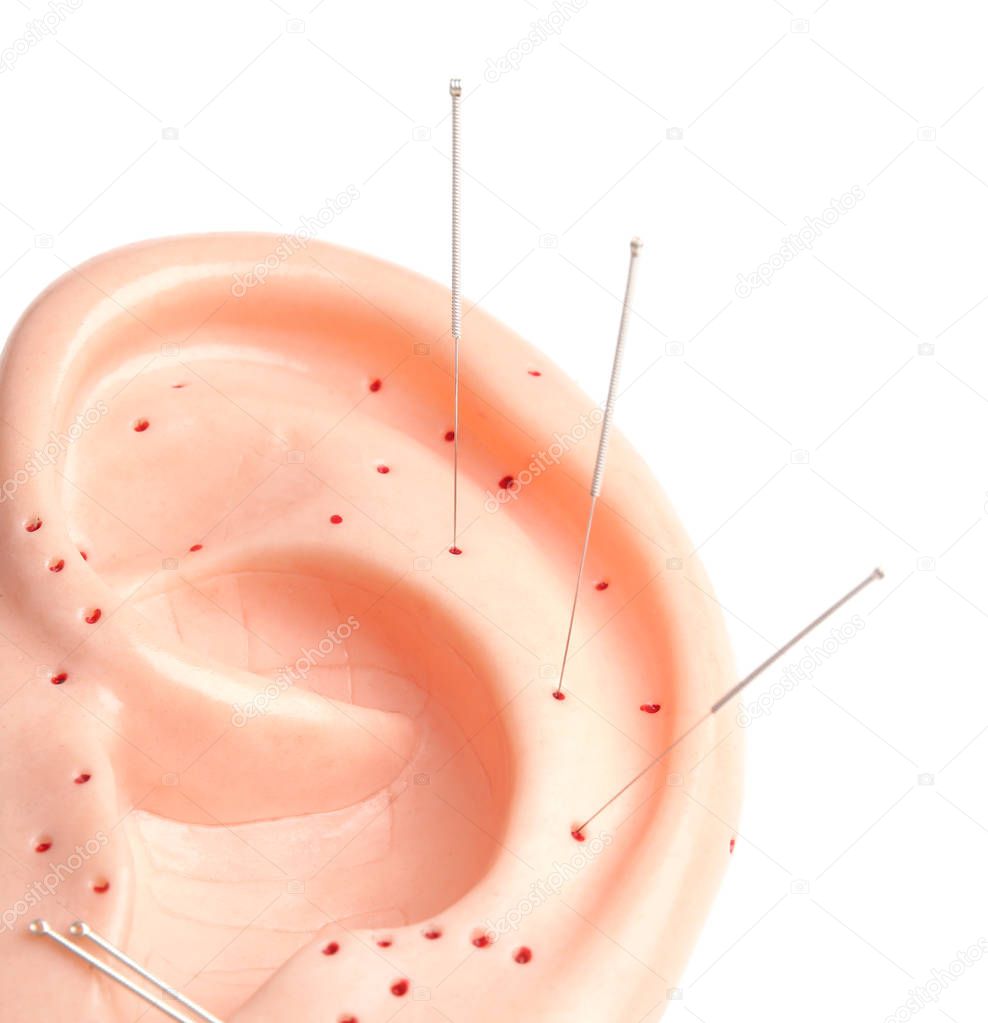 Needles for acupuncture and  mockup of ear 