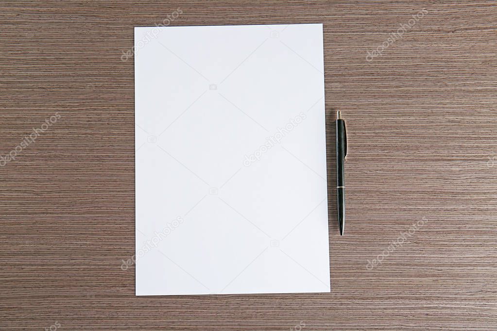 Empty paper sheet with pen