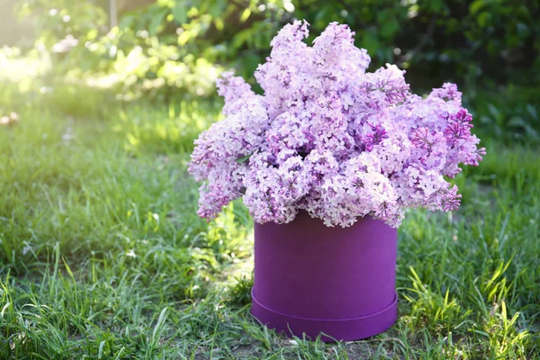 Packaging box with lilac flowers