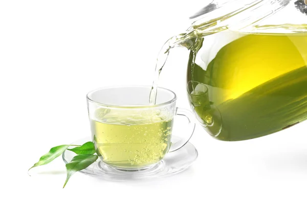 Pouring tea into glass cup — Stock Photo, Image