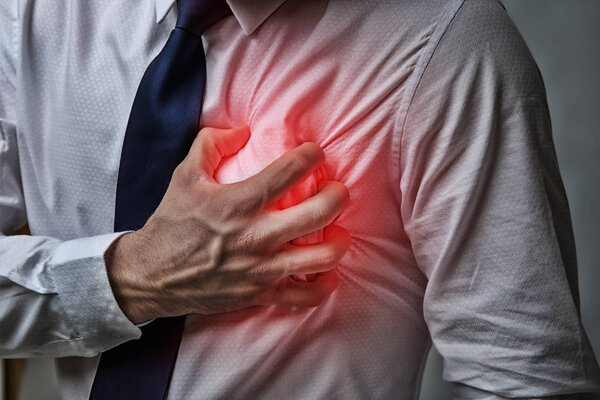 man suffering from chest pain